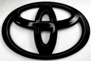 Шильдик автомобильный SHKP Toyota BM черный пластик размер 115мм